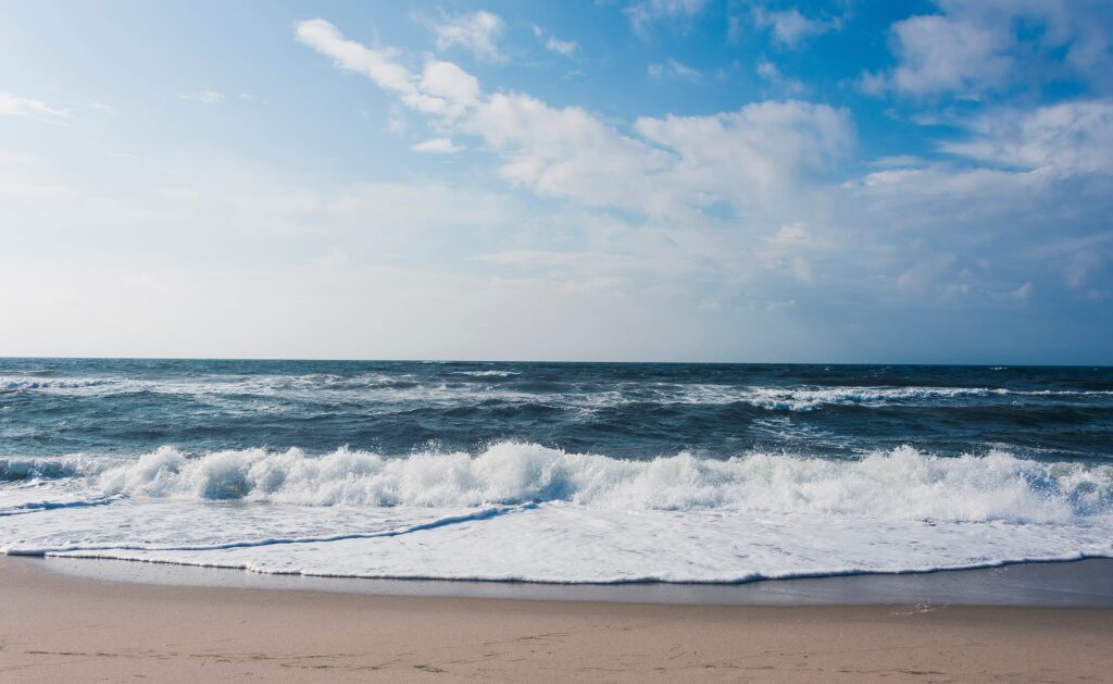 Tide coming in on an Atlantic Ocean beach, symbolizing Sablich Insurance navigating changing tides in the insurance industry