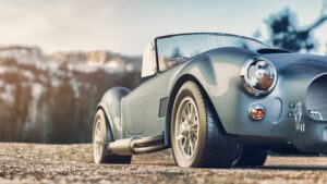 Classic car parked in the mountains in the morning