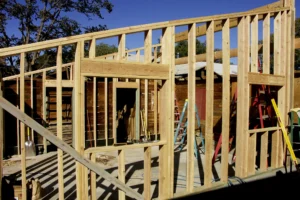 new home addition under construction in framing stage showing why to update insurance after renovations