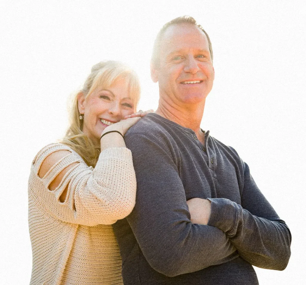 Couple standing together outdoors, representing term life insurance protection and long-term financial security